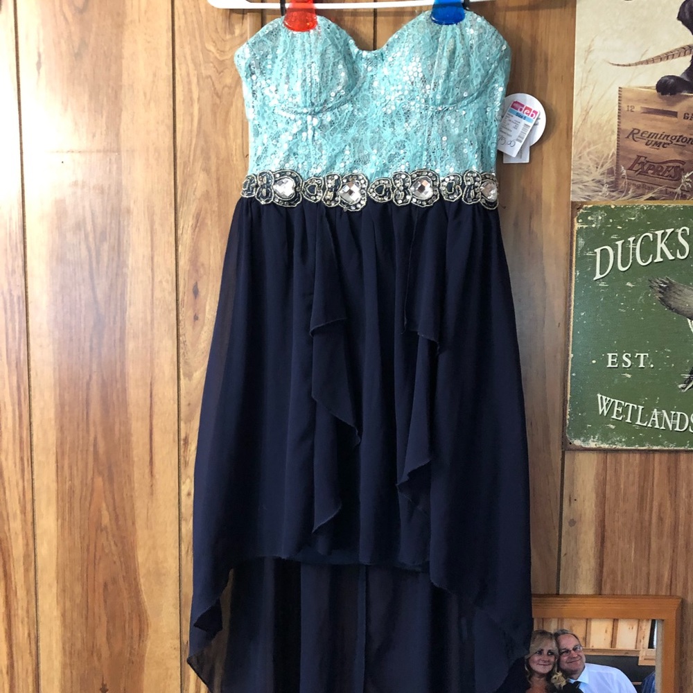 New dress, sparkly and blue.